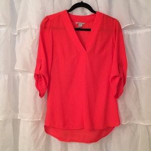 Beautiful orange top perfect for work or a date